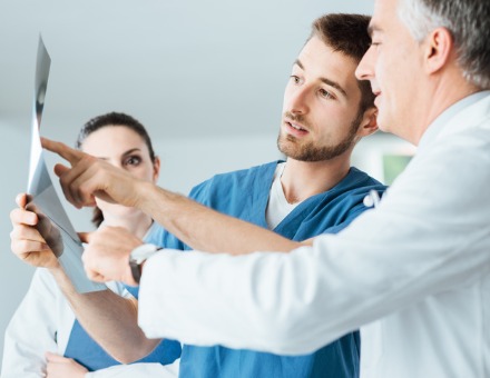 medical-team-examining-patients-xray